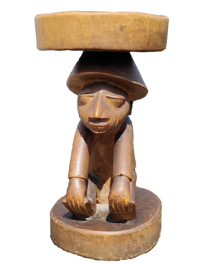 Nigerian Joruba stool, seated capped figure front view