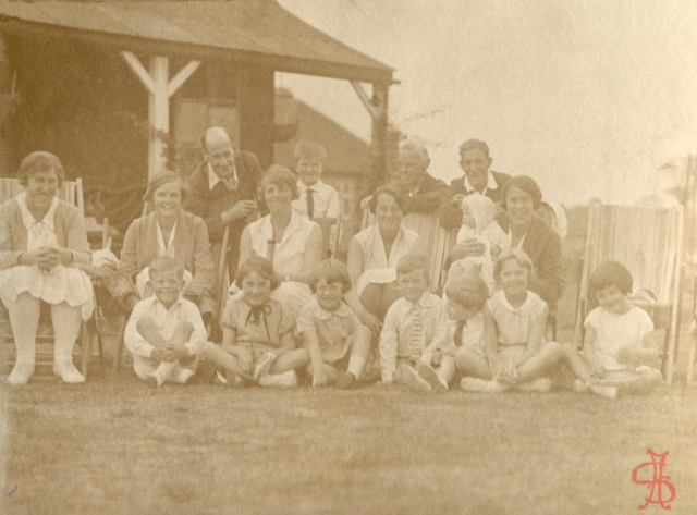 Headstone Lawn Tennis Club members and children outside club house mid 1920s