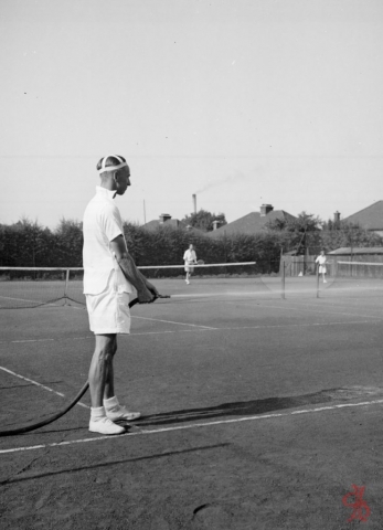 Headstone Lawn Tennis Club 1950s watering the court